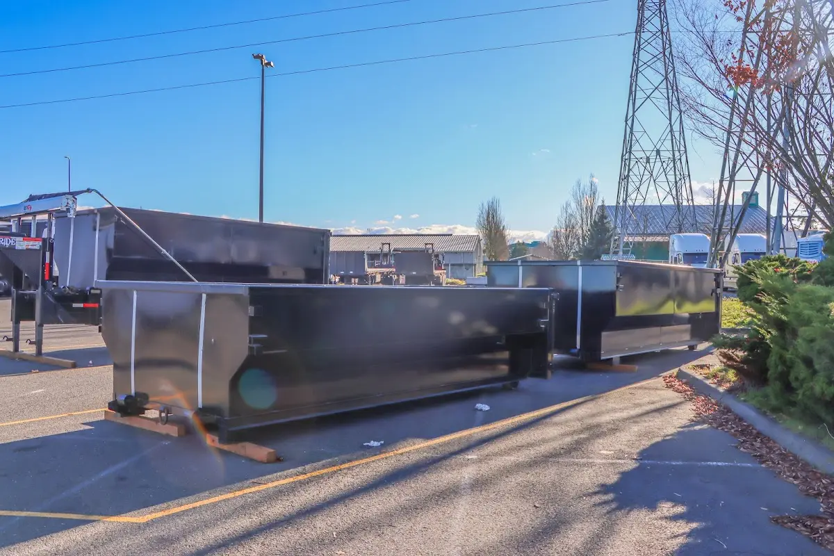 Roll-off dumpster ready for waste disposal at job site for 2 Yard Dumpster Rental in Woodlake